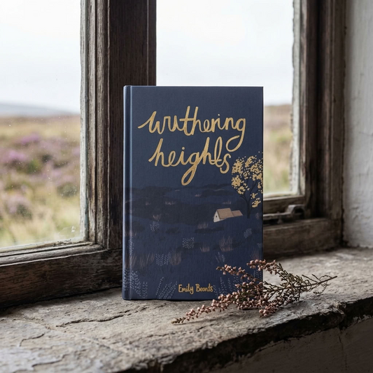 Wuthering Heights by Emily Brontë Wordsworth hardback on an old stone window ledge overlooking the moors